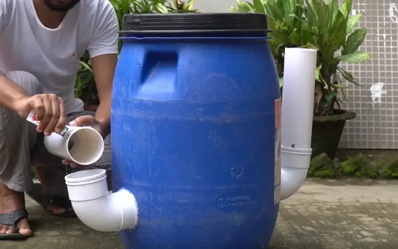 How to Build 2 Cheap Biogas Systems with Plastic Barrels 4 adding the elbow joints